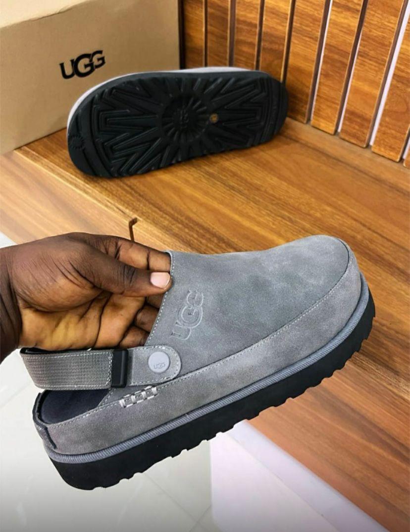 Premium Suede UGG slingback clogs Black suede UGG slingback clogs with thick black platform sole and adjustable strap - luxury men's casual shoes.