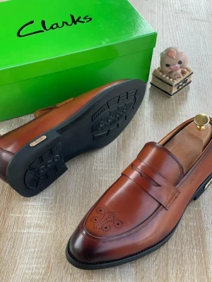 Brown Clarks Tan Leather Penny Loafer with Brogue Detailing