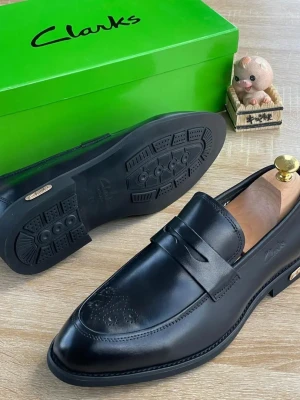 Black Clarks Tan Leather Penny Loafer with Brogue Detailing
