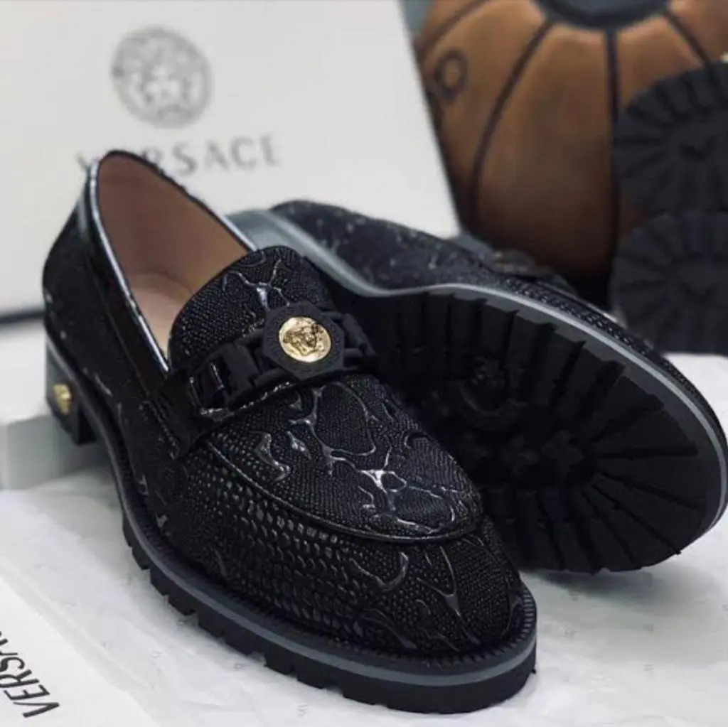 Black Versace Leather Horsebit Loafer Versace Black Leather Horsebit Loafer with Embossed Medusa Pattern,
