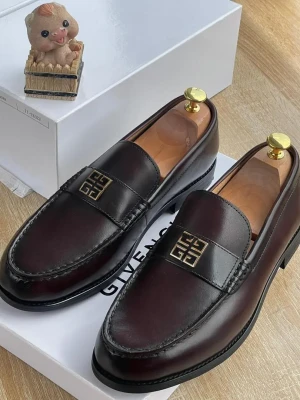 A pair of rich burgundy Givenchy 4G Buckle loafers