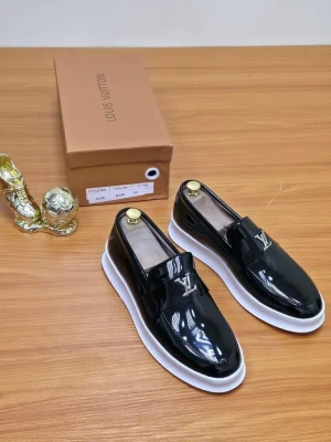 Luxury black patent leather Louis Vuitton loafers
