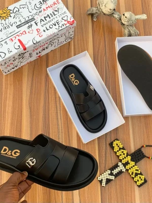 Luxury tan Dolce & Gabbana slide sandals with a sleek leather