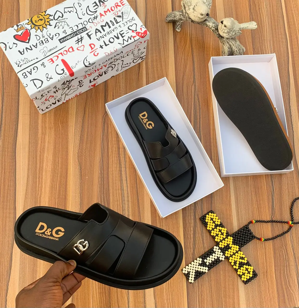 Dolce & Gabbana™ Slide Sandal Luxury tan Dolce & Gabbana slide sandals with a sleek leather