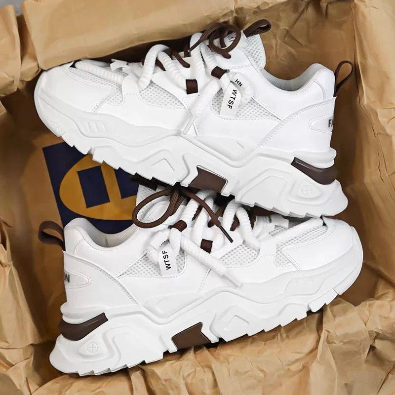 WTSF Men’s Luxury Chunky Sneakers A pair of men's luxury grey chunky sneakers with lime green accents, displayed in a box with brown paper, showcasing their bold design and thick, cushioned sole.