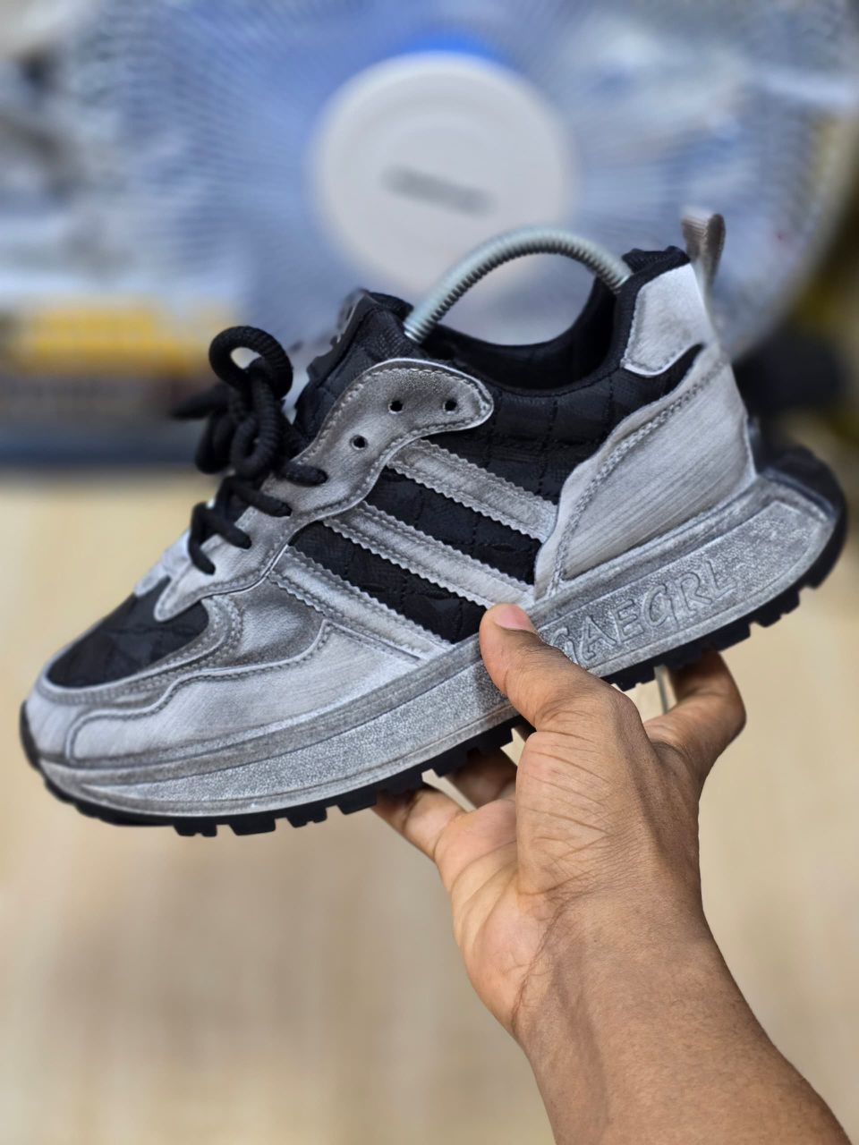 Men’s Luxury Suede Sneakers men's luxury grey suede sneaker with green stripes and laces, showcasing its premium texture and chunky sole design.