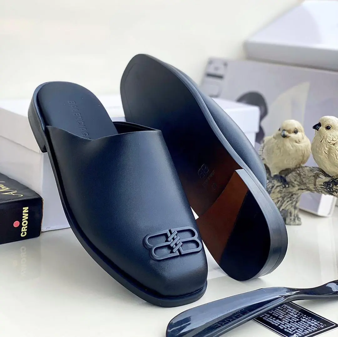 Balenciaga™ Leather Slide Sandal Luxury black Balenciaga BB logo slide sandals with a sleek rubber upper