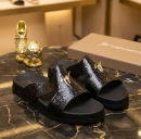 black Giuseppe Zanotti croc-embossed slide sandals