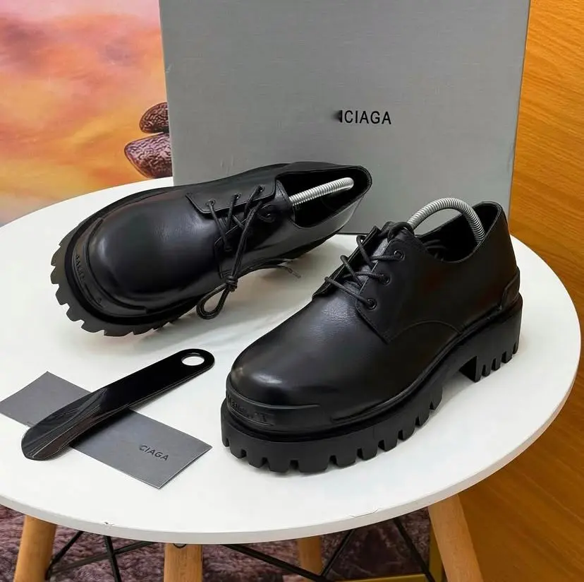 Balenciaga™ Triple S Platform Oxford (Black Leather) black leather Balenciaga Triple S platform oxfords with a sleek upper