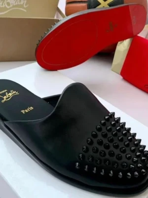 Luxury black Christian Louboutin spikes slide sandals