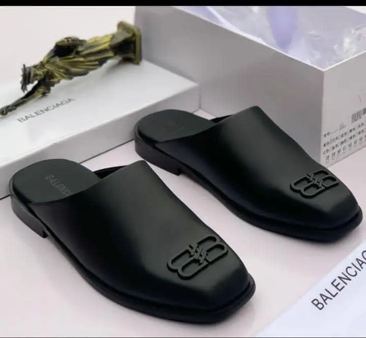 Balenciaga™ Leather Slide Sandal Luxury black Balenciaga BB logo slide sandals with a sleek rubber upper