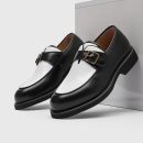 Two-tone black-and-white loafer with brass buckle — currently under verification; no brand markings visible on sole, insole, or packaging. Not yet approved for sale by Swingdot Luxe.