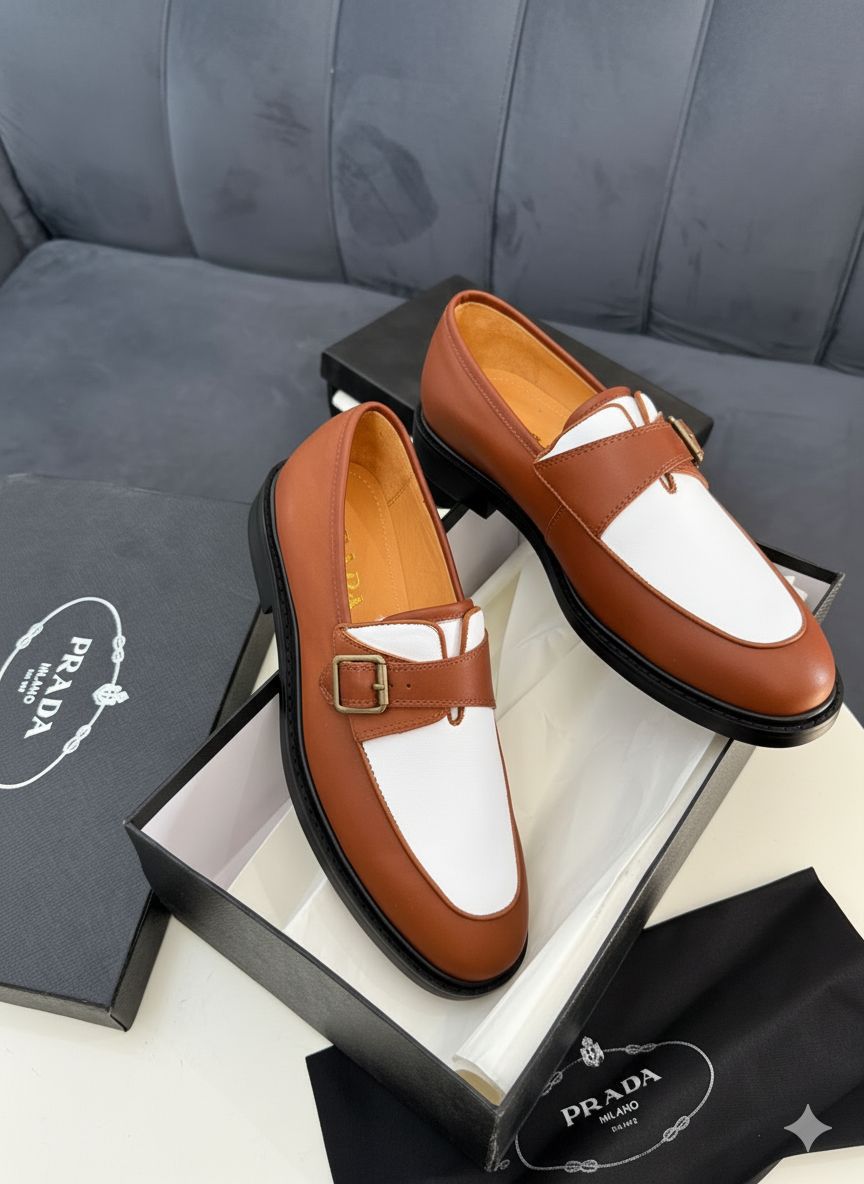 high-quality Italian two-tone loafer Two-tone black-and-white loafer with brass buckle — currently under verification; no brand markings visible on sole, insole, or packaging. Not yet approved for sale by Swingdot Luxe.