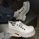 Light grey leather platform sneakers with chunky white lug sole and metal eyelets - luxury men's streetwear shoes with distressed finish