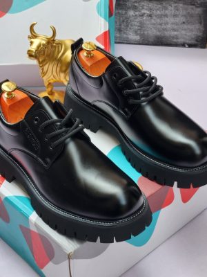 Bold luxury leather derby boots