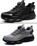 Men's black and grey air-cushion safety sneakers with rotary dial lacing system, hollow-carved sole, and reinforced toe cap, displayed on white background.