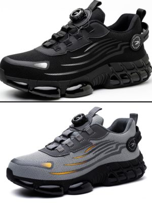 Men's black and grey air-cushion safety sneakers with rotary dial lacing system, hollow-carved sole, and reinforced toe cap, displayed on white background.