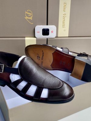 Dino Verratti men's dark brown pebbled leather fisherman sandals with adjustable buckle strap and rubber sole, displayed on branded beige shoeboxes.