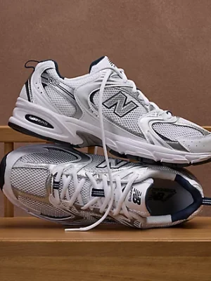 Original NB 530 showcasing precise heel tab branding, consistent sole profile, and authentic material texture — 100% genuine Nigeria