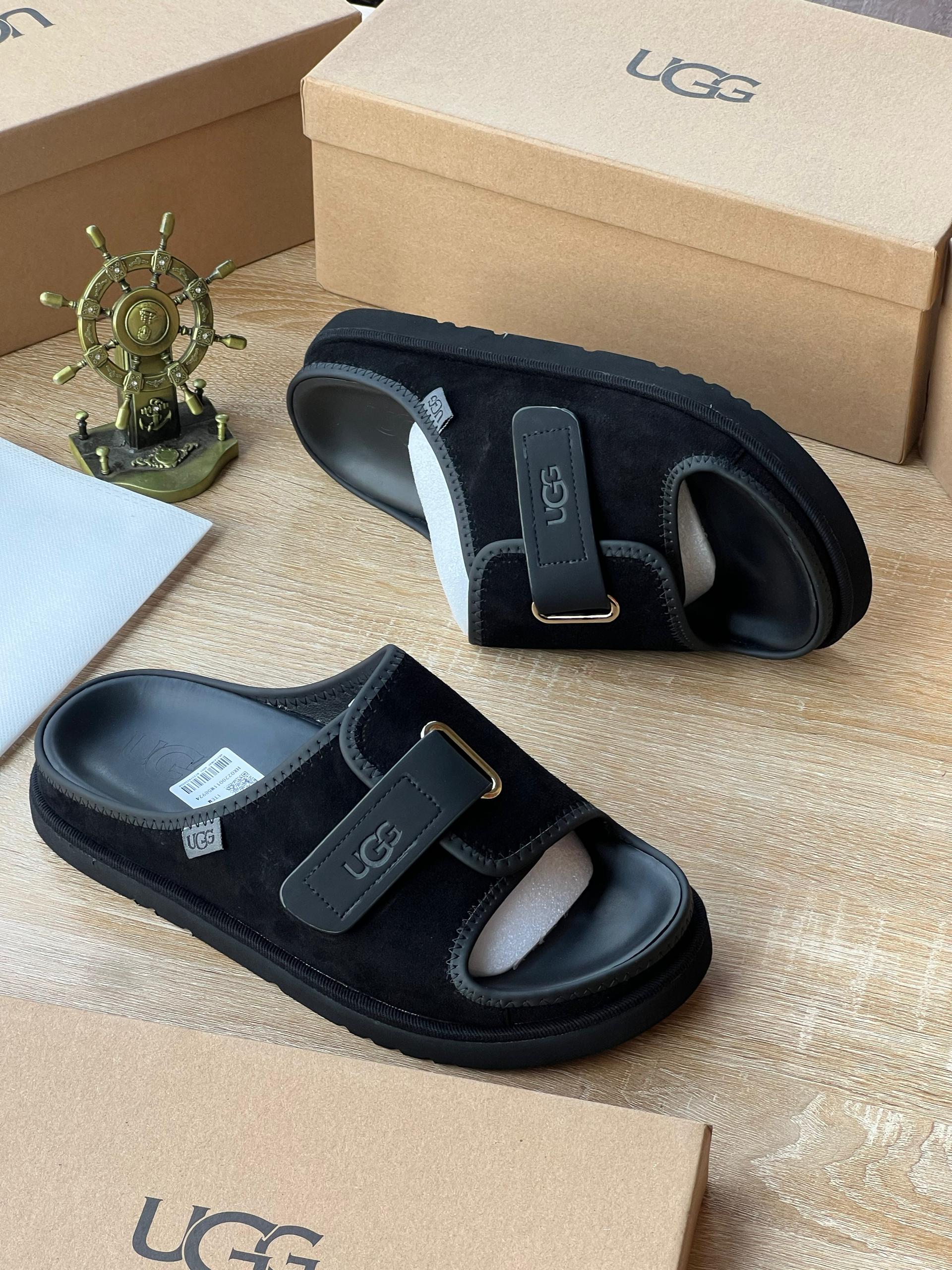 Authentic UGG Coffee Suede Slides Redefine your relaxation with these authentically crafted UGG Coffee Suede Slide Sandals. Designed for the Nigerian gentleman who believes luxury should be felt as much as it is seen, these slides offer a seamless blend of premium comfort and rugged, earthy aesthetics. The upper is fashioned from rich, coffee-brown suede that exudes warmth and sophistication, secured by a sturdy adjustable leather strap with antique brass hardware. The deep-cushioned footbed molds to your arches instantly, providing cloud-like support that makes every step feel effortless, while the durable rubber outsole offers reliable traction on any surface. Unlike flimsy imitations, these are built to last, maintaining their shape and style through daily wear in Lagos heat or weekend getaways. These sandals are more than just footwear; they are your sanctuary after a long day and a statement of refined taste. Pair them effortlessly with linen shorts and a polo for a polished resort look, or with relaxed-fit jeans for a smart-casual evening ensemble. They are the essential accessory for the man who refuses to compromise on quality or comfort. Key Features / Specifications Material: Premium coffee-brown suede upper with genuine leather adjustable strap. Sole: Durable rubber outsole with deep tread pattern for superior grip and longevity. Fit: Adjustable buckle closure for a customized, secure fit; true-to-size sizing. Usage: Ideal for home lounging, beach days, casual outings, travel, and smart-casual summer events. Why settle for less when you deserve the best? Don’t wait for the perfect occasion. This is your everyday power move. Your non-negotiable standard. Your statement of arrival. Click “BUY NOW” — because true luxury doesn’t wait, and neither should you. Limited availability. Authentic. Zero regrets.