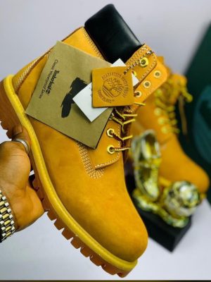 Original Timberland work boot showcasing precise stitching and waterproof tag - 100% genuine Nigeria Timberland Classic boot with branded packaging and matching SKU - Swingdot Luxe verified footwear