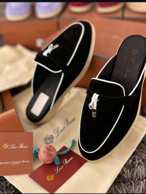 Loro Piana men's black velvet suede Summer Charms Walk loafers with white piping and wooden bead accent, displayed with branded dust bag, cards, and orange shoebox on grey rug.