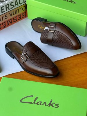 Premium Clarks perforated leather mule