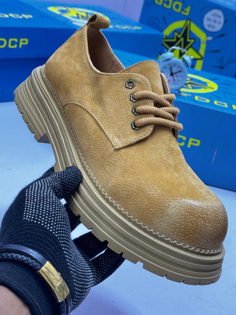 FDCP mustard distressed suede chunky boots FDCP men's mustard distressed suede chunky boots with rope laces and thick ridged platform sole, displayed with blue branded shoebox and vintage alarm clock on white surface.