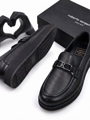 Dark brown men's pebbled leather loafers with silver R-buckle hardware and rubber sole by Roberto Serpentini.