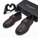 Dark brown men's pebbled leather loafers with silver R-buckle hardware and rubber sole by Roberto Serpentini.