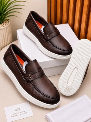 Dark brown men's textured leather penny loafers with white rubber platform sole and classic slip-on design.