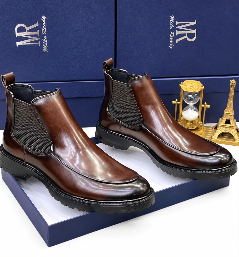 Mike Randy burnished brown leather Chelsea boots Brown men's burnished leather Mike Randy Chelsea boots with elastic side panels and rugged rubber lug sole.
