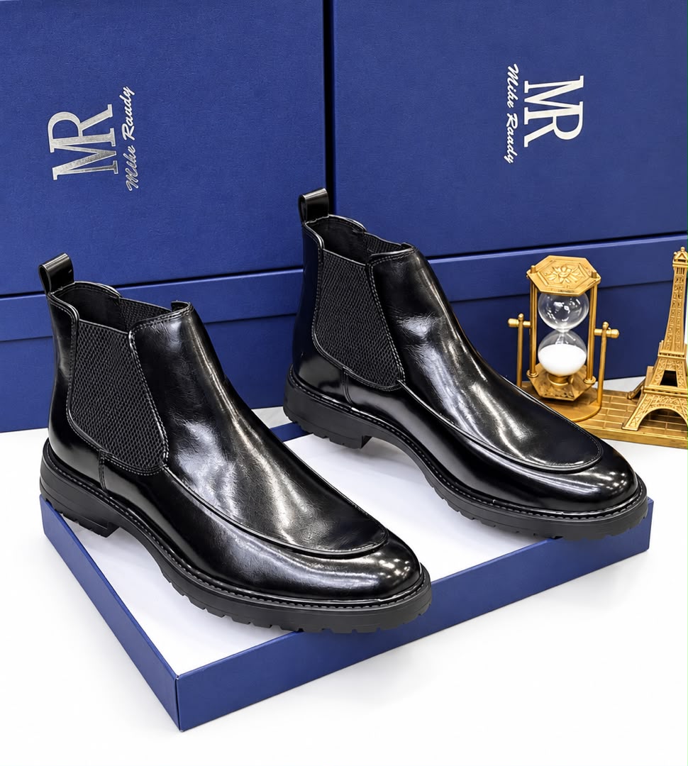 Mike Randy burnished brown leather Chelsea boots Brown men's burnished leather Mike Randy Chelsea boots with elastic side panels and rugged rubber lug sole.