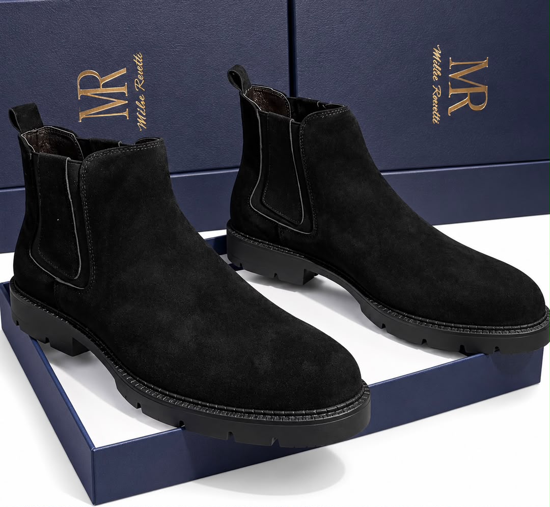 Black men's suede Mike Revetti Chelsea boots with elastic side panels and rubber sole.